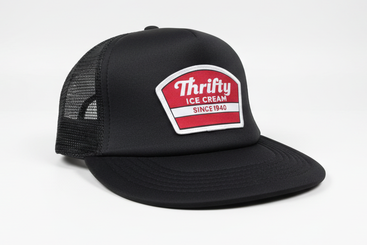 Thrifty Black Logo Trucker Hat